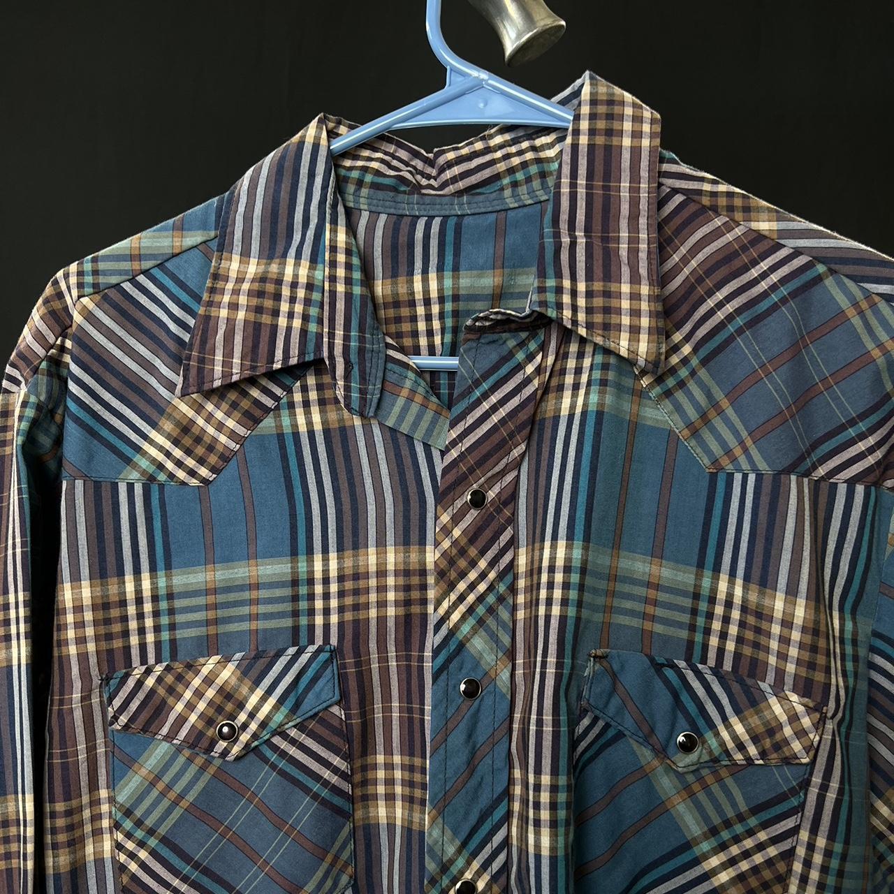 Blue and brown plaid Pearl snap shirt with a western vibe western wear