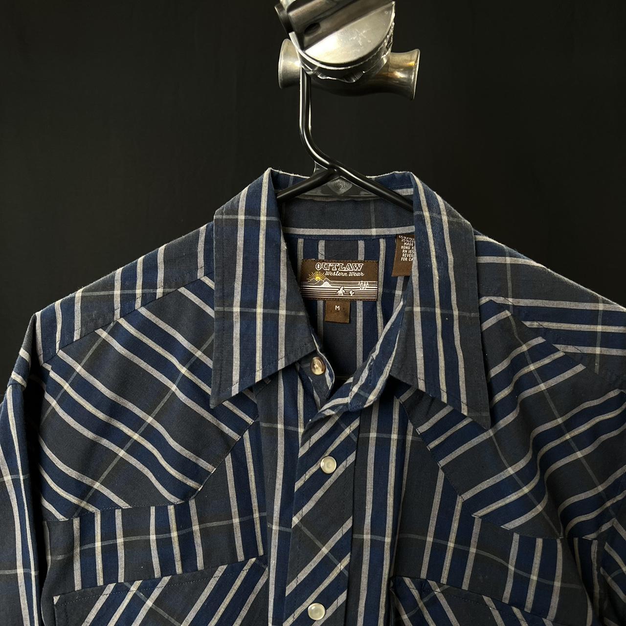 Blue plaid Pearl snap shirt with a western shirt
