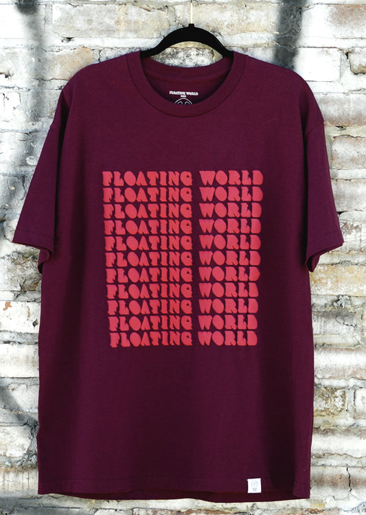 FLOATING WORLD Bold Repeating "What Makes You Float?" T-Shirt (Red)